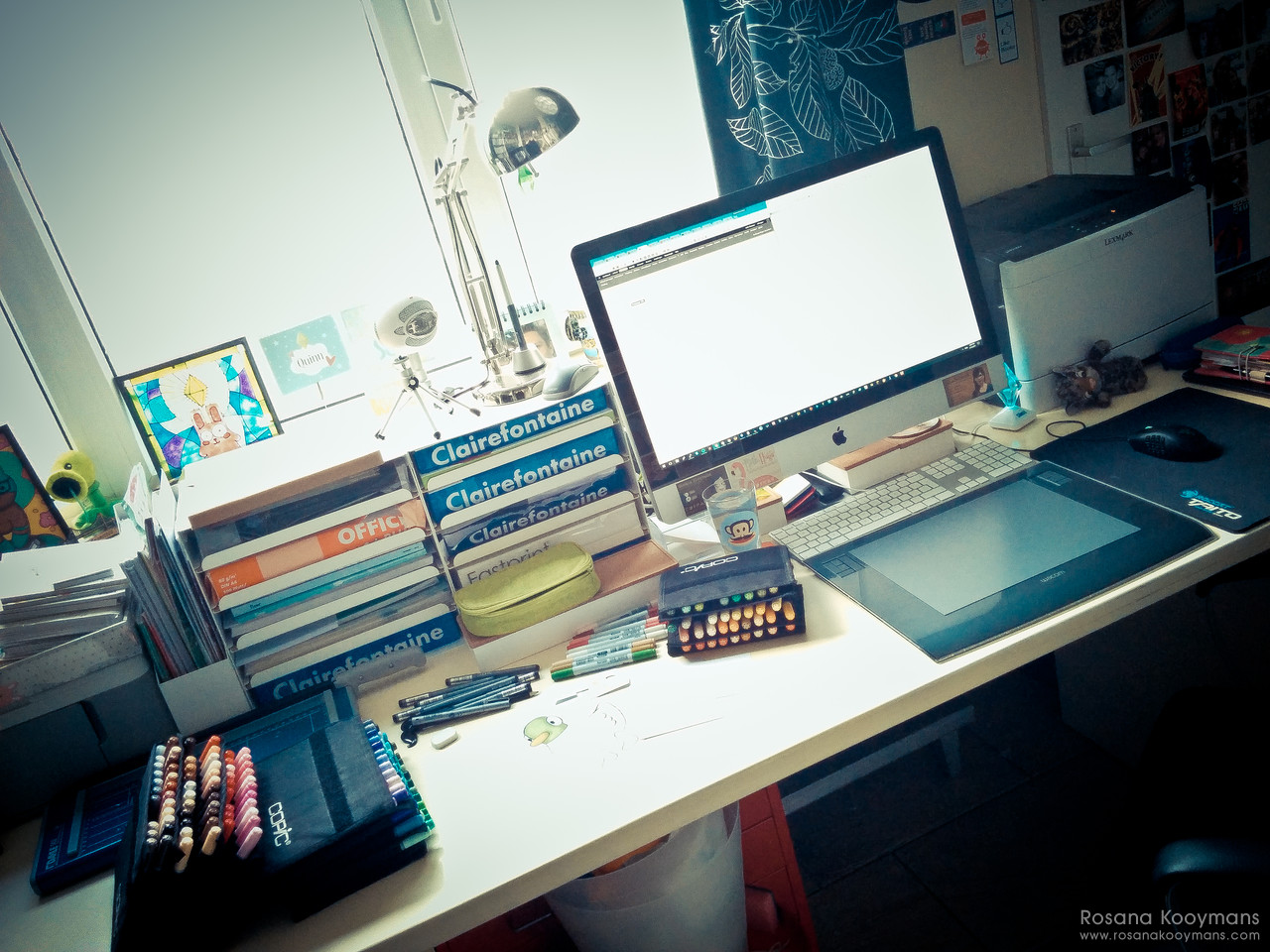 The middle of my main (computer) desk with my Mac, two KVISSLE letter trays where I keep my printing paper, my Wacom tablet, and on the right there's my massive laser printer. 365 - February 15, 2017: studio office WWDWWD desk workplace workspace work