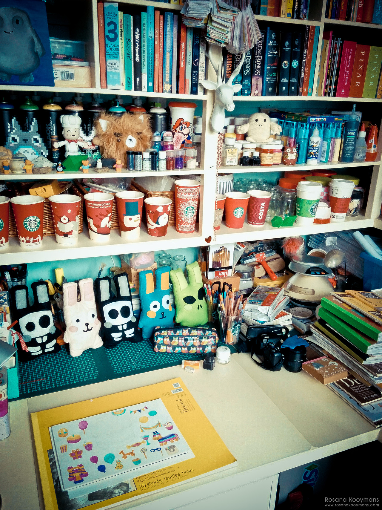 My drawing and painting desk, although my Copics aren't in this photo (they're often on my main desk). Tons of Freezer Bunnies here too haha. 365 - February 15, 2017: studio office WWDWWD Freezer Bunny Starbucks desk workplace workspace work